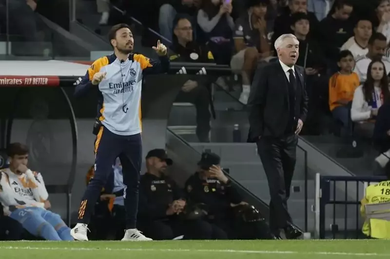 أنشيلوتي ونجله - صورة أرشيفية